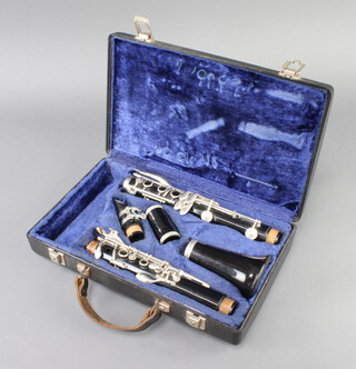 A clarinet marked 238205 contained in a Boosey and Hawkes case 