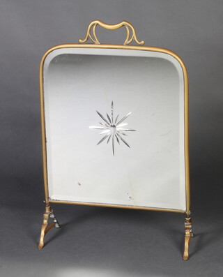 A Victorian oval cut and bevelled glass fire screen contained in a gilt metal frame 60cm x 38cm x 17cm 