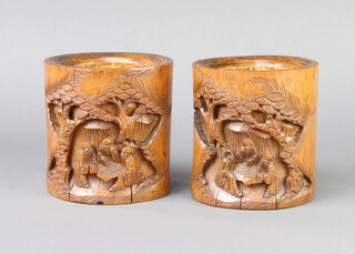 A pair of Chinese oval carved bamboo vases decorated figures 12cm x 11cm x 9cm 