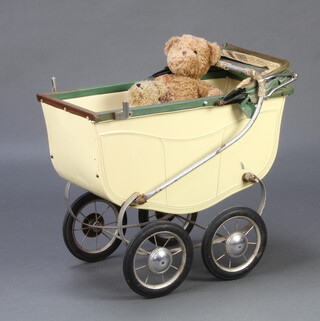 A child's Triang perambulator (dent to front) together with 2 modern teddybears 