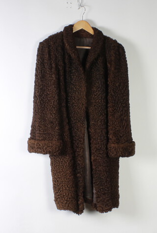 A lady's brown Persian lamb jacket 
