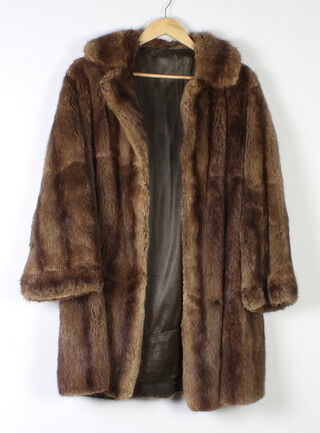 A lady's quarter length fur coat