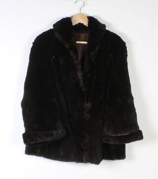 A lady's quarter length black fur coat (some moulting) 