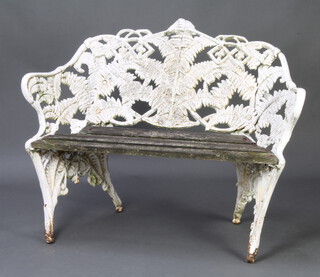 A Coalbrookdale cast iron fern and blackberry pattern garden seat with wooden slatted seat, the back marked CEF? 84cm h x 117cm w x 53cm d 