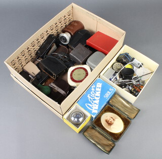 A Pentax Auto 110 camera, a Phago Anastigmatic 1:4.5 F=75MM no.93910 camera lens, a Roussel Paris 323447 Taylor 1:4.5 F=75 lens and a collection of light meters, etc 