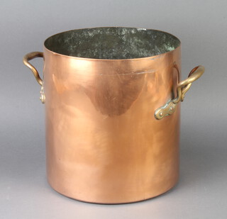 A cylindrical copper twin handled stock pot 26cm h x 25cm diam. 