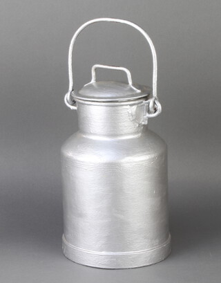 A cylindrical metal milk carrier 29cm h x 18cm diam. 