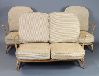 Ercol, a beech framed cottage style 3 piece suite comprising 2 seat settee and 2 matching armchairs - settee 65cm h x 139cm w x 82cm w (There is a break to the back of the 1 of the chairs) 