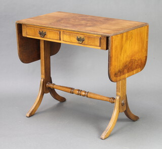 A Georgian style walnut sofa table fitted 2 drawers, raised on standard end supports 75cm h x 82cm w x 50cm d 