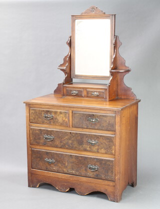 An Edwardian walnut dressing chest with rectangular bevelled plate mirror and 2 glove drawers above 2 short and 2 long drawers 162cm h x 91cm w x 50cm d 