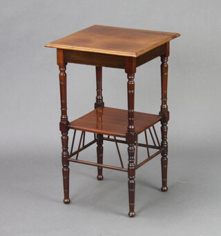 An Edwardian square Art Nouveau mahogany 2 tier occasional table on turned supports 66cm h x 40cm w x 40cm d (light contact marks to the top) 