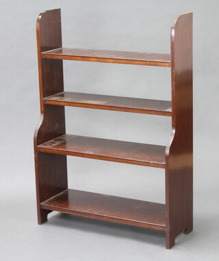 An oak 4 tier waterfall bookcase 109cm h x 76cm w x 27cm d 