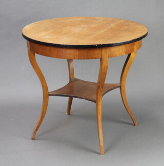 A 1950's circular walnut finished 2 tier occasional table on cabriole supports 71cm h x 80cm diam. 