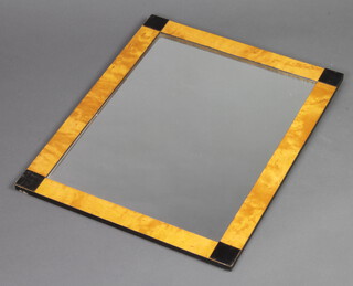 An Art Deco style rectangular plate wall mirror contained in a walnut and ebonised   frame 55cm x 43cm 