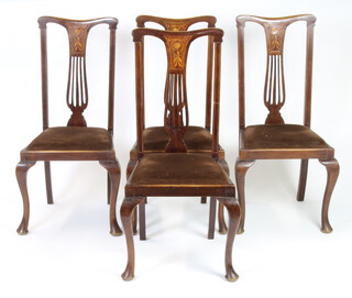 A set of 4 Edwardian inlaid mahogany slat back dining chairs with upholstered drop in seats on cabriole supports 
