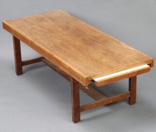 A mid Century rectangular teak coffee table fitted a brushing slide, raised on square supports with H framed stretcher 38cm h x 122cm w x 49cm d (sun bleaching and water damage to the top) 