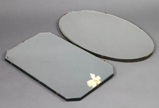 An Art Deco oval bevelled plate frameless wall mirror 41cm x 69cm and a ditto lozenge shape 36cm x 61cm 