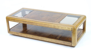 A rectangular American style cherry 2 tier coffee table with plate glass panels to the sides 40cm h x 140cm w x 63cm d 