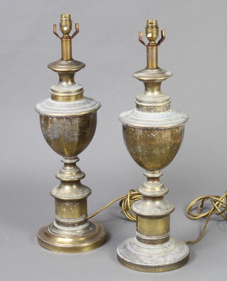 A pair of gilt metal urn shaped table lamps 53cm h x 17cm diam. 