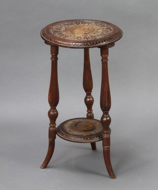 An Edwardian circular carved walnut 2 tier jardiniere stand 63cm x 35cm (ring marks to the top) 