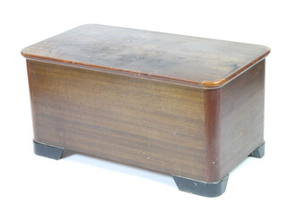 A 1930's hardwood coffer with hinged lid, raised on bracket feet 56cm h x 112cm w x 61cm d (water marks and scratches in places) 