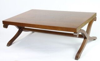 A rectangular Georgian style mahogany coffee table raised on X framed supports 49cm h x 139cm l x 90cm w
