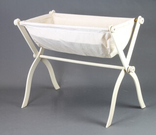 A child's 19th/20th Century white painted pine and fabric rocking cradle 80cm h x 97cm l x 51cm w  