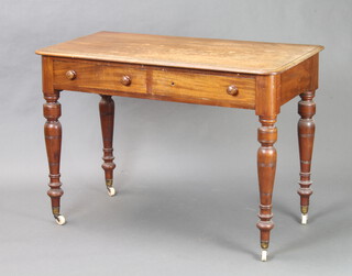 A Victorian mahogany D shaped side table fitted 2 drawers, raised on turned supports 75cm h x 107cm w x 55cm d (split to top and water damaged) 