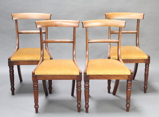 A set of 4 19th Century mahogany bar back dining chairs with plain mid rails and upholstered drop in seats, raised on turned supports (sun bleached, 2 have old repairs to the back and 1 to the leg)  