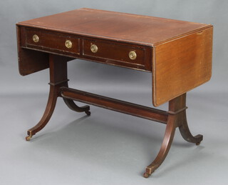 A Georgian style mahogany sofa table fitted 2 drawers, raised on standard end supports with an H framed stretcher 73cm h x 93cm w x 62cm d (split and marks to the top) 