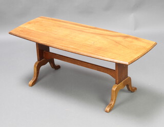 A Georgian style oval hardwood coffee table raised on standard end supports with H framed stretcher 39cm h x 99cm l x 42cm w