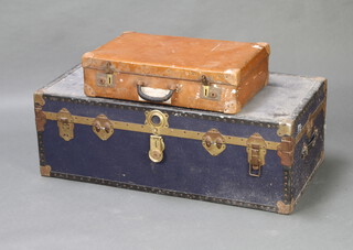 A blue fibre bound cabin trunk 36cm x 101cm x 51cm together with a fibre suitcase 15cm x 60cm x 38cm 