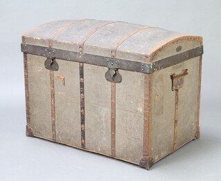 Dock Du Campement, a 19th Century domed fibre and metal bound cabin trunk 64cm h x 85cm w x 56cm d (handles missing) 