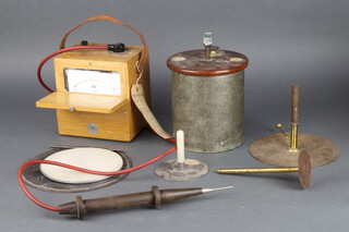 A Wright of Westminster bomb calorimeter together with an electrostatic proof planes and a kilovolt meter 