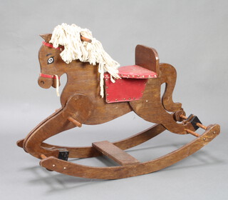 A plywood rocking horse 73cm h x 99cm w x 37cm d 