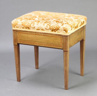 An Edwardian rectangular inlaid bleached mahogany piano stool with over stuffed seats, on square tapered supports 50cm h x 48cm w x 38cm d (scuffing to the edge, contact marks and pitting in places)