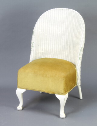 A white painted Lloyd Loom nursing chair with upholstered seat 