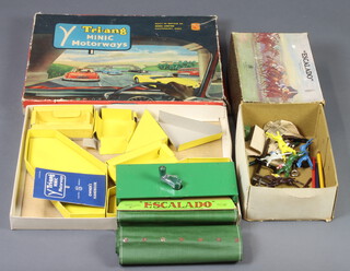 An Escalado race game and a Triang Minic motorway game (box in poor condition) 