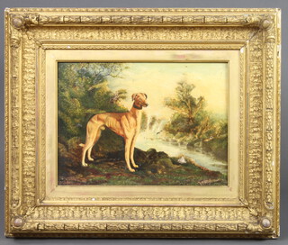 A 19th Century oil painting on canvas, study of a standing dog by a river, indistinctly signed to bottom right hand corner 26cm x 37cm  in a gilt frame (holed) 