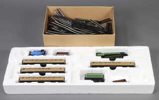 A Hornby Dublo train set - Flying Scotsman locomotive tender, 3 carriages, tank engine and 2 coal wagons together with rails 