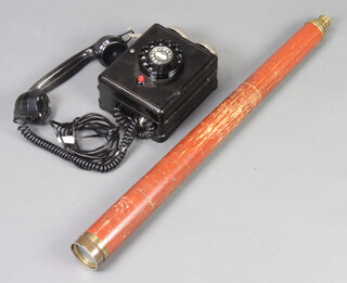 A 19th Century gilt metal and mahogany telescope and a wall mounting telephone (2) 