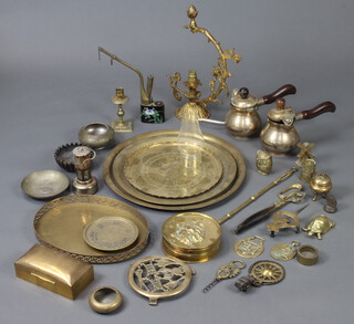 Two brass side handled coffee pots and a collection of brassware 