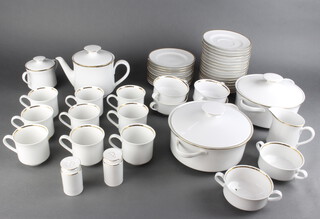 A Jonelle part tea and dinner service with gilt rims comprising 8 tea cups, 8 saucers, 6 two handled bowls and 6 saucers, tea pot, milk jug, sugar bowl, 11 side plates, 7 medium plates, 8 dinner plates, 8 soup bowls, 2 tureens and covers, a cover, pair of condiments