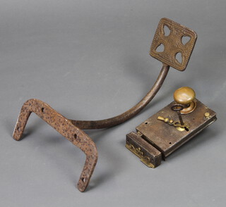 A 19th Century iron carriage step together with an iron lock 