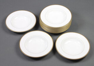 Ten Royal Worcester white glazed soup bowls with gilt banding 23cm 