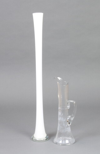 An opaque glass specimen vase 79cm h x 10cm diam. together with a clear glass jug with handle 40cm h  