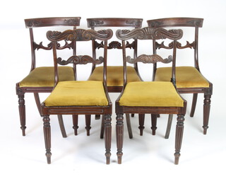 A set of 3 19th Century carved mahogany bar back dining chairs with shaped mid rails and upholstered drop in seats, raised turned and reeded supports (backs loose) together with a similar pair of bar back chairs (5) 