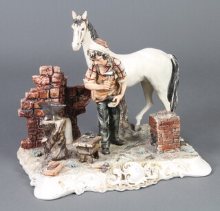 A large Capodimonte group of a blacksmith and horse 29cm (a tool is chipped) 