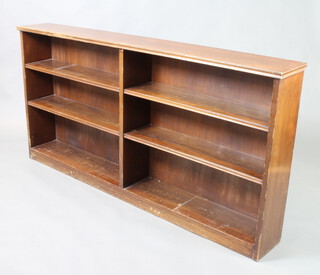 A mahogany open bookcase raised on a platform base 85cm h x 168cm w x 23cm d (some contact marks) 