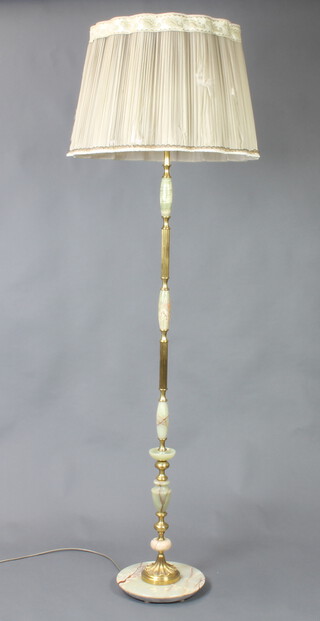 A chrome and onyx standard lamp 